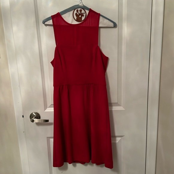 Red sleeveless cocktail dress with gold button - Picture 1 of 4